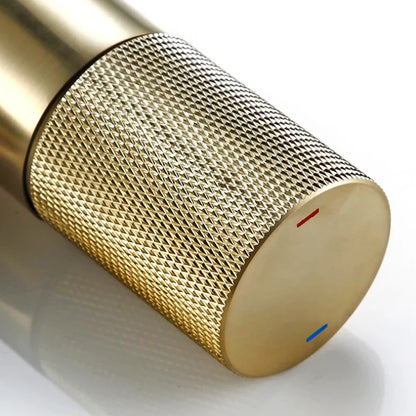 Mitigeur lavabo en laiton or brossé